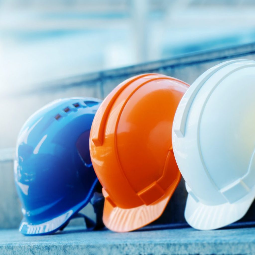 Multicolored Safety Construction Worker Hats. Teamwork of the construction team must have quality. Whether it is engineering, construction workers. Have a helmet to wear at work. For safety at work.